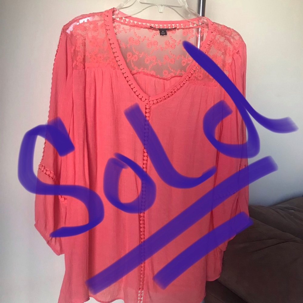 Beautiful coral colored blouse with lace detail